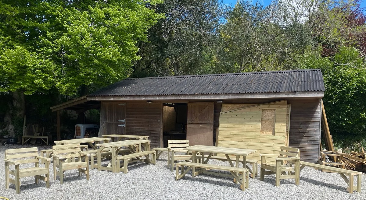 James Turpin and his handmade benches at the Lostwithiel workshop