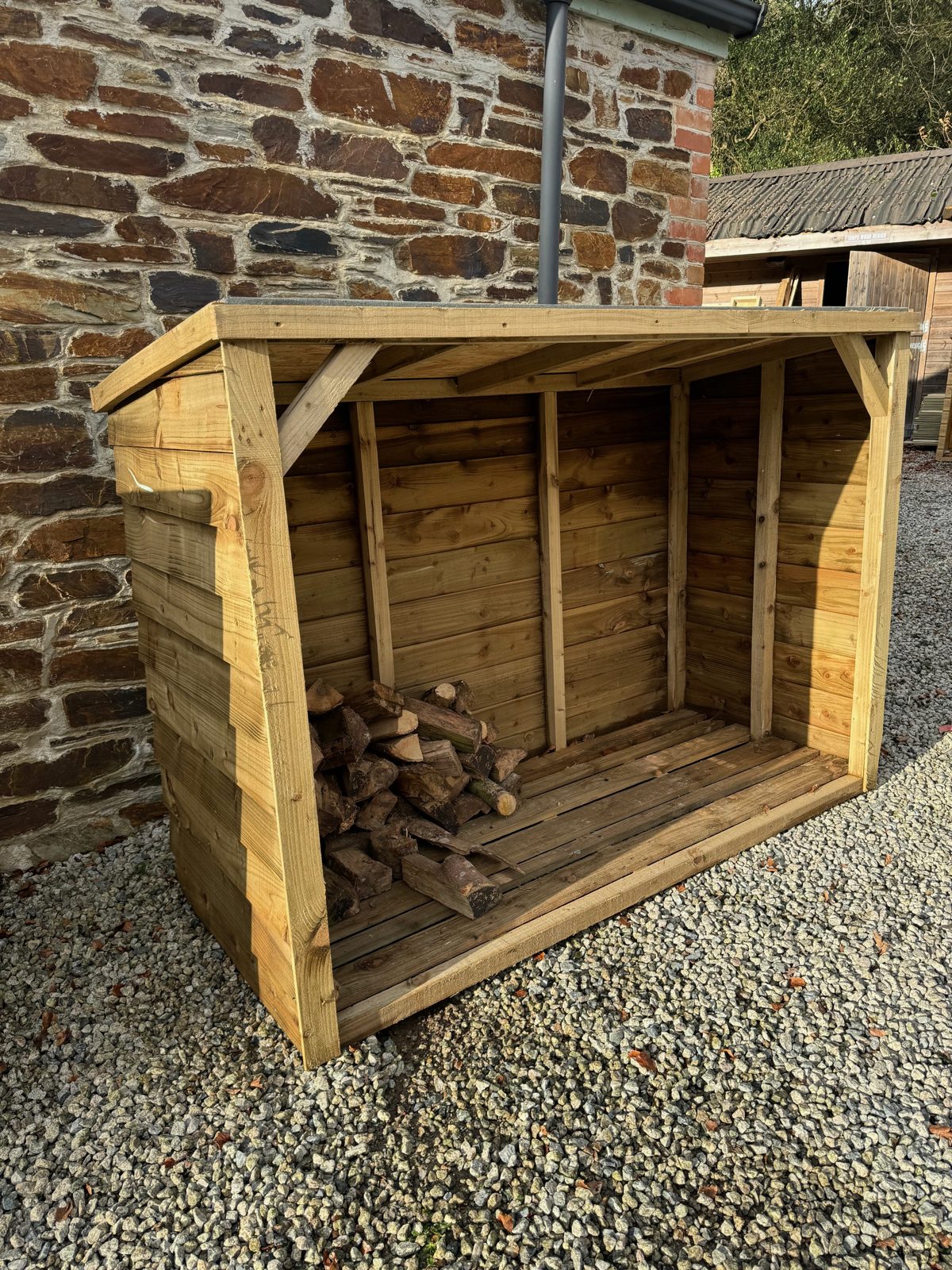 Large Featheredge Log Store — handmade timber